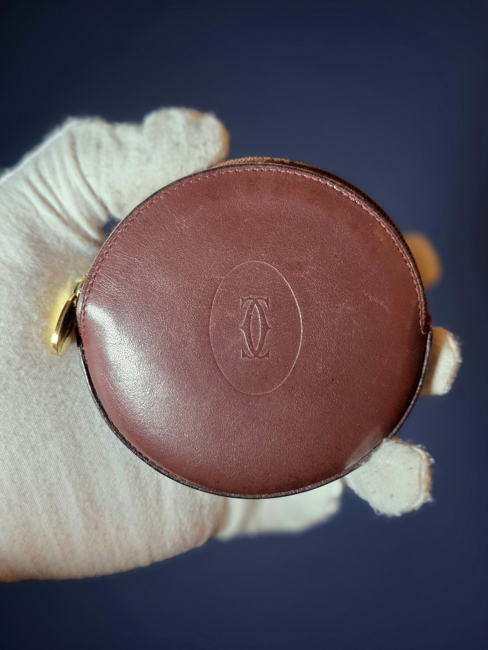 Cartier Burgundy Leather Round Coin Pouch with Gold Hardware